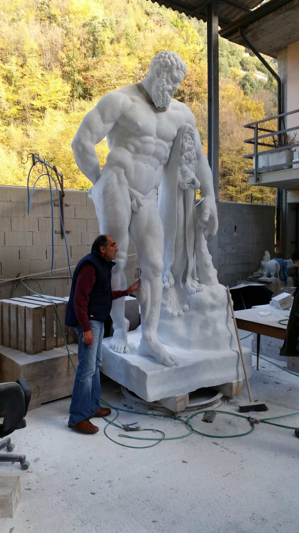 replica of the farnese's hercules of the national archaeological museum of naples in white carrara marble. The huge marble sculpture is now available for sale at bazzanti art gallery florence.