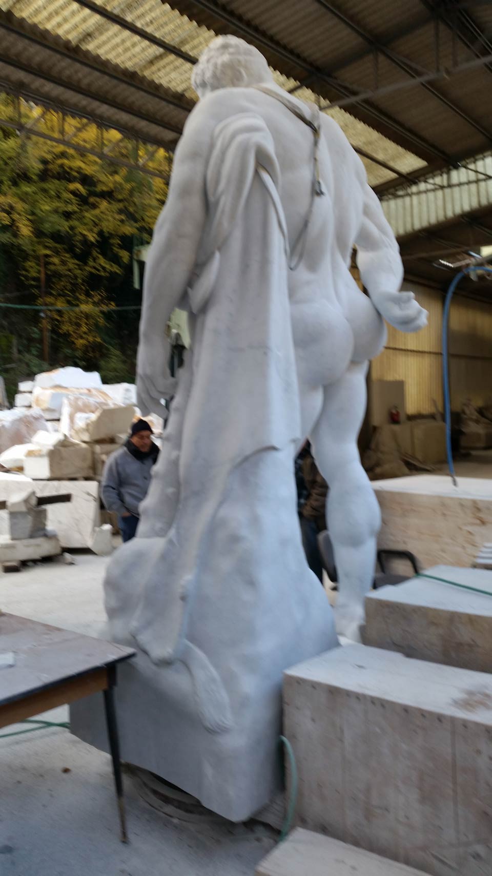 replica of the farnese's hercules of the national archaeological museum of naples in white carrara marble. The huge marble sculpture is now available for sale at bazzanti art gallery florence.
